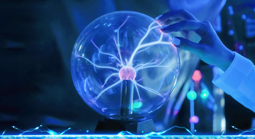 Who discovered that electrons are negatively charged?