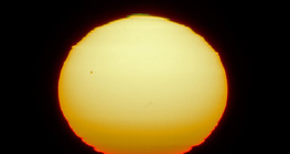 Sunspots on the surface of the sun that is distorted due to refraction