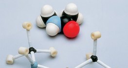 Space-filling and ball-and-stick models of a N-methylacetamide molecule