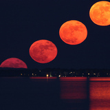 Multiple exposure of the rising full moon