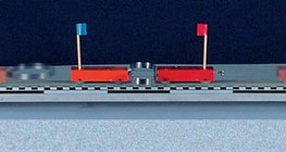 Pushing away two cars of equal mass with a spring