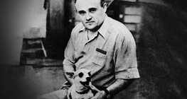 Sergei Korolev, the founder of the Soviet space program, with a dog that has returned from an experimental rocket flight (1954)
