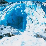 Glacial stream coming out from a glacier cave entrance