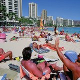 Banhos de sol na praia