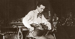 Béla Bartók playing hurdy-gurdy