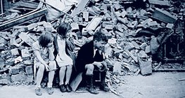 Consequences of aerial warfare: children on the ruins