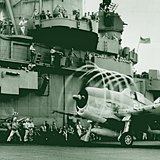 Fighter plane taking off from an American aircraft carrier