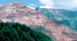 Open-cast iron ore mine in the Alps