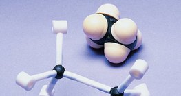 Space-filling and stick model of the ethane molecule with the lowest energy conformation