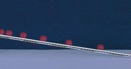 Ball rolling down a slope