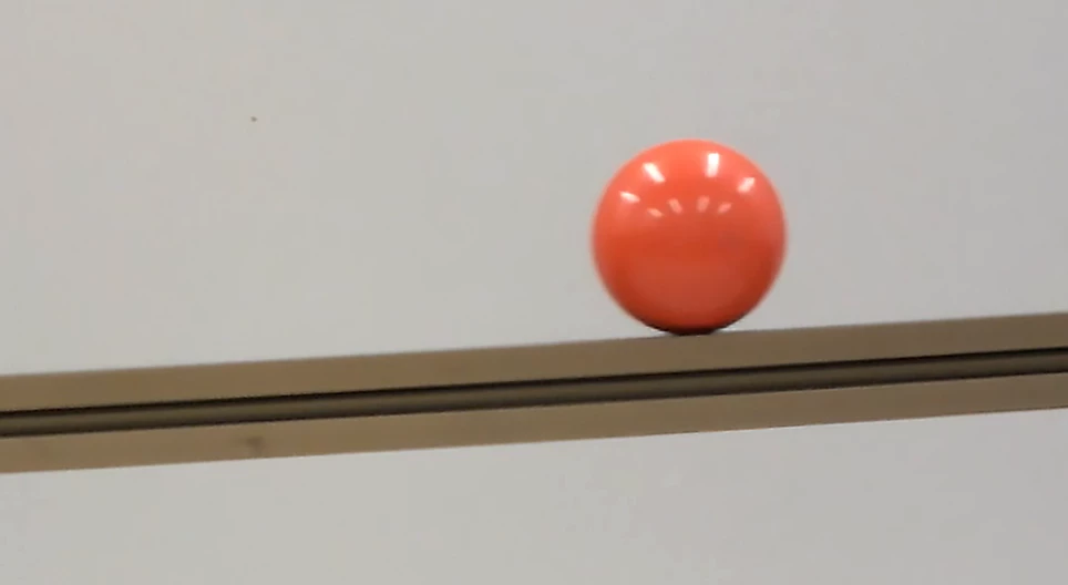 Ball rolling down on an inclined plane