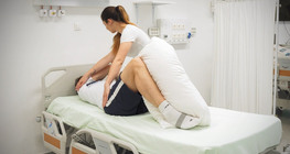 Following hip surgery: sitting up and standing