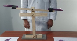 Candle and water seesaws