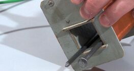 Iron nails in an electromagnetic coil